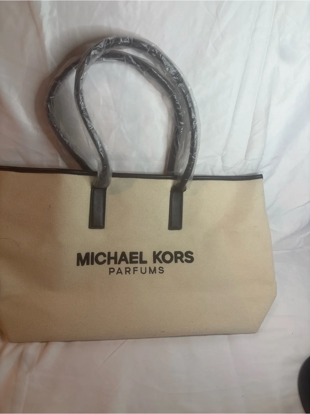 Michael Kors Beige Canvas Tote with Black Trim and Handles